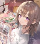  1girl absurdres bag blush book brown_hair closed_mouth highres holding holding_book indoors looking_at_viewer medium_hair momoko_(momopoco) original paper_bag shirt sitting smile solo violet_eyes white_shirt 