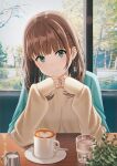  1girl bangs blue_eyes blue_jacket blunt_bangs blush brown_hair casual closed_mouth coffee coffee_mug cup day drinking_glass earrings eyebrows_visible_through_hair heart highres hyuuga_azuri indoors jacket jacket_on_shoulders jewelry latte_art long_hair long_sleeves looking_at_viewer milk mug original sleeves_past_wrists smile solo spoon sweater table tree water window yellow_sweater 