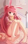  1girl absurdres animal_ears bangs bare_legs barefoot bed bitseon blush calendar_(object) commentary covered_mouth eyebrows_visible_through_hair feet full_body hair_ornament hair_scrunchie highres indoors knees_up korean_text long_hair looking_at_viewer object_hug on_bed one_side_up pink_scrunchie rabbit_ears red_eyes redhead scrunchie soles solo star_(symbol) stuffed_animal stuffed_toy teddy_bear toes translation_request very_long_hair 