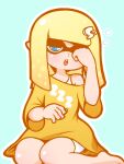  1girl aqua_background barefoot blonde_hair blue_eyes inkling letter_hair_ornament mike_inel off_shoulder open_mouth pointy_ears rubbing_eyes shirt shorts sitting solo splatoon_(series) white_shorts yellow_shirt yokozuwari 