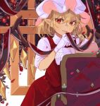  1girl absurdres arm_rest bangs blonde_hair chair closed_mouth collared_shirt cowboy_shot crossed_bangs crystal dress eyebrows_visible_through_hair finger_to_own_chin flandre_scarlet gloves hair_between_eyes hat highres kneeling light_smile looking_at_viewer mob_cap pointy_ears puffy_short_sleeves puffy_sleeves red_dress red_eyes shi_chimi shirt short_hair short_sleeves solo touhou white_gloves white_headwear white_shirt wings 
