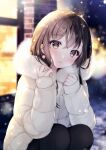  1girl :o black_legwear blurry blurry_background blush brown_eyes brown_hair building earrings fur_collar fur_trim head_tilt highres jacket jewelry long_hair long_sleeves looking_at_viewer open_mouth original outdoors pantyhose solo squatting white_jacket window yugirlpict 