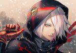  1boy black_coat coat colored_skin eyeshadow fate/grand_order fate_(series) gloves gradient_hair green_eyes hair_over_one_eye hood hood_up karna_(fate) karna_(santa)_(fate) looking_at_viewer makeup male_focus multicolored_hair ooki1089 pink_hair red_gloves short_hair snowing solo tsurime upper_body white_hair white_skin 