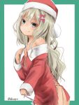  1girl akino_shuu blonde_hair blush bow christmas closed_mouth collarbone cowboy_shot grecale_(kantai_collection) green_eyes hair_between_eyes hair_bow hat jewelry kantai_collection long_hair long_sleeves pink_bow ring santa_costume santa_hat smile solo tongue tongue_out twitter_username wedding_band 