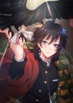  1boy ahoge animal arm_up bangs black_hair black_jacket blue_eyes closed_mouth hair_between_eyes haori highres jacket japanese_clothes kimetsu_no_yaiba long_hair long_sleeves looking_at_another male_focus otoufu_(gotouhu) outstretched_hand smile solo tomioka_giyuu uniform upper_body 