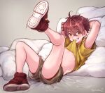 1boy ahoge arms_behind_head bangs blush brown_eyes brown_hair fang full_body gothicrifuru grin hair_between_eyes highres mouth_hold on_bed original pillow shirt_lift shoes short_shorts shorts sitting smile sneakers solo twitter_username underwear 