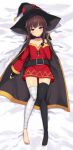  1girl bandaged_leg bandages barefoot bed_sheet belt black_belt black_cape black_gloves black_hair black_headwear black_legwear black_shorts blush cape closed_mouth commentary dakimakura_(medium) dress fingerless_gloves from_above frown gloves hat highres kono_subarashii_sekai_ni_shukufuku_wo! long_sleeves looking_at_viewer lying megumin off-shoulder_dress off_shoulder on_back on_bed red_dress red_eyes short_dress short_hair_with_long_locks shorts single_thighhigh solo sweatdrop thigh-highs witch_hat yu_65026 