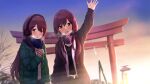  2girls :d arm_up bangs black_shirt blue_scarf blurry blurry_background blush breath brown_eyes brown_hair brown_jacket commentary_request depth_of_field earmuffs eyebrows_visible_through_hair fringe_trim gloves green_jacket grey_gloves hair_between_eyes highres idolmaster idolmaster_shiny_colors jacket long_hair long_sleeves looking_at_viewer multiple_girls oosaki_amana oosaki_tenka open_clothes open_jacket open_mouth outdoors railing scarf shirt siblings sisters smile suzuki_puramo torii twins upper_body very_long_hair white_jacket 