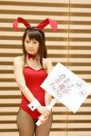   animal_ears asahina_mikuru rabbit_ears collar cosplay fishnet_stockings hiromichi leotard photo sign suzumiya_haruhi_no_yuuutsu  