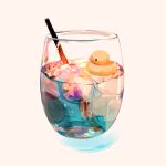  cup drink drinking_glass drinking_straw food ice ice_cube jauni_(tofublock) no_humans original pink_background rubber_duck shiny simple_background still_life 