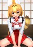  1girl :d absurdres alternate_costume animal_ear_fluff animal_ears bangs blonde_hair blush brown_eyes deku_suke extra_ears eyebrows_visible_through_hair fang hair_between_eyes hakama_skirt head_tilt highres japanese_clothes kemono_friends looking_at_viewer no_shoes open_mouth pleated_skirt red_skirt serval_(kemono_friends) serval_ears serval_tail shouji sitting skin_fang skirt sliding_doors smile socks solo tail tasuki white_legwear 