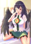  1girl ;o absurdres arm_behind_back bangs barefoot bird_wings black_hair black_wings bloom blush breasts collared_shirt commentary_request eyebrows_visible_through_hair frilled_shirt_collar frills green_skirt hair_between_eyes hand_to_own_mouth highres indoors large_breasts long_hair looking_at_viewer o1118 on_bed one_eye_closed pillow red_eyes reiuji_utsuho shirt short_sleeves sitting skirt solo tearing_up third_eye touhou upper_teeth very_long_hair wall wariza white_shirt wing_collar wings yawning 