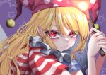  1girl american_flag_dress blonde_hair closed_mouth clownpiece fairy_wings fall_dommmmmer frown hat highres holding holding_torch jester_cap long_hair looking_at_viewer neck_ruff pointy_ears polka_dot purple_background purple_headwear red_eyes short_sleeves simple_background solo star_(symbol) striped torch touhou upper_body wings 
