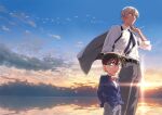  2boys :d amuro_tooru animal bangs bird black_neckwear blazer blonde_hair blue_eyes blue_jacket blue_sky bow bowtie brown_hair child clouds collared_shirt commentary_request day edogawa_conan feet_out_of_frame glasses grey_jacket grey_pants grey_shorts hair_between_eyes hand_in_pocket horizon jacket jacket_on_shoulders jacket_removed k_gear_labo looking_at_viewer looking_to_the_side male_focus meitantei_conan multiple_boys necktie open_mouth outdoors pants red_bow red_neckwear reflection reflective_water shirt shirt_tucked_in short_hair shorts sky smile standing sun upper_teeth water white_shirt 