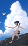  1girl bare_legs barefoot black_hair clouds cloudy_sky crop_top dead-robot denim denim_shorts grass hill navel original paper_airplane ponytail short_shorts shorts sky smile tan tank_top tied_hair wind 