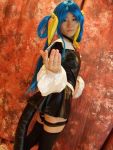  blue_hair boots cosplay dizzy garters guilty_gear kabura_hitori_(model) midriff photo thigh-highs twintails 