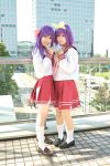  cosplay hair_bow hair_bows hair_ribbons hiiragi_kagami hiiragi_tsukasa kanazaki_shino lucky_star photo purple_hair rindou_sana sailor_uniform school_uniform socks twintails 