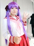  cosplay hair_ribbons hiiragi_kagami lucky_star naito photo purple_hair sailor_uniform school_uniform twintails 