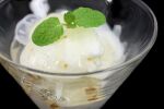  7/11_(fukuso) black_background blurry close-up cup dessert food food_focus glass ice_cream leaf no_humans original simple_background single_scoop still_life 