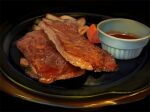  blurry carrot commentary food food_focus kuro_(kurodoodle22) meat no_humans original plate sauce saucer simple_background steak still_life 
