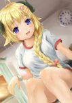  1girl :d absurdres animal_ears bangs blonde_hair blurry blurry_background blush bow braid breasts clock commentary_request curled_horns depth_of_field dutch_angle eyebrows_visible_through_hair feet_out_of_frame gym_shirt gym_shorts gym_uniform hair_bow hair_over_shoulder highres hololive horns indoors long_hair looking_at_viewer medium_breasts ohiensis open_mouth pink_bow red_shorts sheep_ears sheep_girl sheep_horns shirt short_shorts short_sleeves shorts single_braid sitting smile solo sweat tsunomaki_watame very_long_hair violet_eyes virtual_youtuber wall_clock wristband 