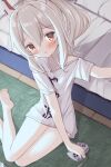  1girl ayanami_(azur_lane) azur_lane bangs bare_legs barefoot bed bed_sheet blush carpet collarbone commentary_request controller eyebrows_visible_through_hair from_above game_controller head_tilt headgear irokari long_hair looking_at_viewer looking_up orange_eyes oversized_clothes oversized_shirt pajamas parted_lips ponytail shirt sidelocks silver_hair sitting solo thighs translation_request wariza white_shirt wooden_floor 
