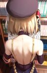  1girl aoi_tiduru armband azur_lane back bare_shoulders beret black_gloves blonde_hair book bookshelf elbow_gloves from_behind gloves hair_ribbon hat highres open_book ribbon short_hair solo suspenders z23_(azur_lane) 