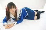  bed cosplay hair_ribbons photo sailor_uniform sakura_yayoi school_uniform thigh-highs twintails zettai_ryouiki 
