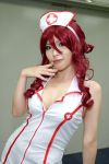  cosplay emi_kou_(model) fishnet_stockings nurse nurse_uniform photo redhead 