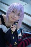  belt_as_garter cosplay kaieda_kae lollipop photo purple_hair rosario+vampire shirayuki_mizore striped tank_top thigh-highs 