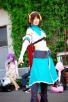  armband cape cosplay hair_ribbons halter_top leggings midriff ousawa_karin photo suzumiya_haruhi suzumiya_haruhi_no_tomadoi suzumiya_haruhi_no_yuuutsu sword 