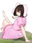  1girl animal_ears arm_support bangs barefoot black_hair bunny_tail carrot_necklace floppy_ears frilled_sleeves frills from_behind full_body grass hair_between_eyes highres inaba_tewi kakone leg_up looking_at_viewer open_mouth pink_shirt pink_skirt rabbit_ears red_eyes shirt short_hair short_sleeves simple_background sitting skirt skirt_set smile solo tail touhou white_background 