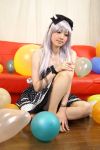  balloon cosplay couch dress female hair_bow photo ribbon saya silver_hair sitting solo 