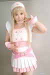  blonde_hair cosplay dream_of_doll nurse nurse_uniform photo thigh-highs twingky yuuna 