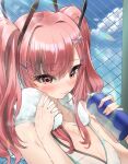  1girl applepie_(12711019) azur_lane bangs bare_shoulders blush bottle breasts bremerton_(azur_lane) bremerton_(scorching-hot_training)_(azur_lane) chain-link_fence fence hair_ornament hairclip highres large_breasts long_hair multicolored_hair pink_eyes pink_hair sleeveless smile solo sportswear streaked_hair sweat towel twintails water_bottle x_hair_ornament 