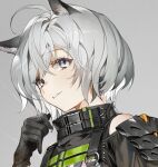  1girl ahoge animal_ear_fluff animal_ears armor black_gloves black_jacket cat_ears closed_mouth commentary eyebrows_visible_through_hair gloves grey_background grey_eyes grin hair_between_eyes highres jacket looking_at_viewer original portrait short_hair shoulder_armor shycocoa silver_hair simple_background smile solo strap symbol_commentary 