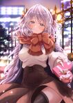  1girl absurdres bangs black_legwear blurry blurry_background blush brown_skirt building chocolate city_lights closed_mouth coat commentary_request fate/grand_order fate_(series) gift highres holding huge_filesize long_hair long_sleeves looking_at_viewer marie_antoinette_(fate) night outdoors outstretched_arm purple_coat railing red_scarf scarf sidelocks signature silver_hair skirt smile solo sweater thigh-highs thighs totomiya valentine violet_eyes white_sweater 