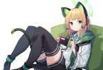  1girl black_legwear blonde_hair blue_archive cat_ear_headphones green_eyes headphones highres jacket looking_at_viewer midori_(blue_archive) pillow playing_games ribbon school_uniform short_hair shorts sidelocks simple_background sitting solo thigh-highs twintails white_background z_loader 