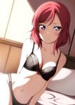  1girl arm_behind_back bangs bare_shoulders black_bra black_panties bra breasts closed_mouth collarbone commentary day eyebrows_visible_through_hair highres indoors looking_at_viewer love_live! love_live!_school_idol_project medium_hair navel nishikino_maki on_bed panties pillow redhead reno_0901 shadow solo sunlight swept_bangs underwear underwear_only violet_eyes 