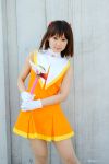  card_captor_sakura cheerleader cosplay gloves hairclip hiromichi kinomoto_sakura photo pom_poms wand 