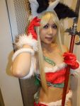  animal_ears blonde_hair bra cat_ears chains cosplay horn kisaragi_towa liese photo polearm santa seiken_densetsu_3 