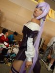 brabelt cosplay dizzy guilty_gear hair_bows onihara_akira open_dress purple_hair thigh-highs 