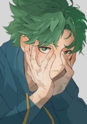  1boy blue_hoodie boku_no_hero_academia closed_mouth commentary_request drawstring freckles green_eyes green_hair grey_background hands_on_own_cheeks hands_on_own_face highres hood hood_down hoodie korean_commentary looking_at_viewer magga_zip male_focus midoriya_izuku scar scar_on_hand short_hair simple_background solo 