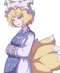  1girl absurdres bangs blonde_hair dress eyebrows_behind_hair fox_tail from_side hands_together hat highres kame_(kamepan44231) long_sleeves looking_at_viewer multiple_tails open_mouth pillow_hat short_hair simple_background solo standing tabard tail touhou white_background white_dress white_headwear yakumo_ran yellow_eyes 