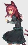  1girl :o alternate_hairstyle animal_ear_fluff animal_ears bangs blunt_bangs blush cat_ears cat_tail commentary_request dress eyebrows_visible_through_hair fang feet_out_of_frame from_side green_dress grey_background highres juliet_sleeves kaenbyou_rin koyu_(ctsa2278) long_hair long_sleeves looking_at_viewer looking_back multiple_tails nekomata open_mouth puffy_sleeves red_eyes redhead simple_background solo standing tail touhou two_tails 