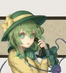  1girl atianshi bangs bright_pupils buttons chinese_commentary collared_shirt commentary_request dated diamond_button frilled_shirt_collar frilled_sleeves frills green_eyes green_hair green_headwear green_pupils hair_between_eyes hat hat_ribbon highres holding holding_phone komeiji_koishi long_sleeves medium_hair open_mouth phone ribbon shirt solo third_eye touhou yellow_ribbon yellow_shirt 