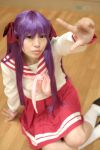  cosplay hair_ribbons hiiragi_kagami lucky_star naito photo purple_hair sailor_uniform school_uniform socks twintails 