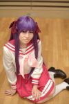  cosplay hair_ribbons hiiragi_kagami lucky_star naito photo purple_hair sailor_uniform school_uniform socks twintails 