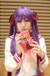  cosplay hair_ribbons hiiragi_kagami lucky_star naito photo pocky purple_hair sailor_uniform school_uniform socks twintails 