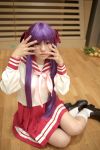  cosplay hair_ribbons hiiragi_kagami lucky_star naito photo purple_hair sailor_uniform school_uniform socks twintails 